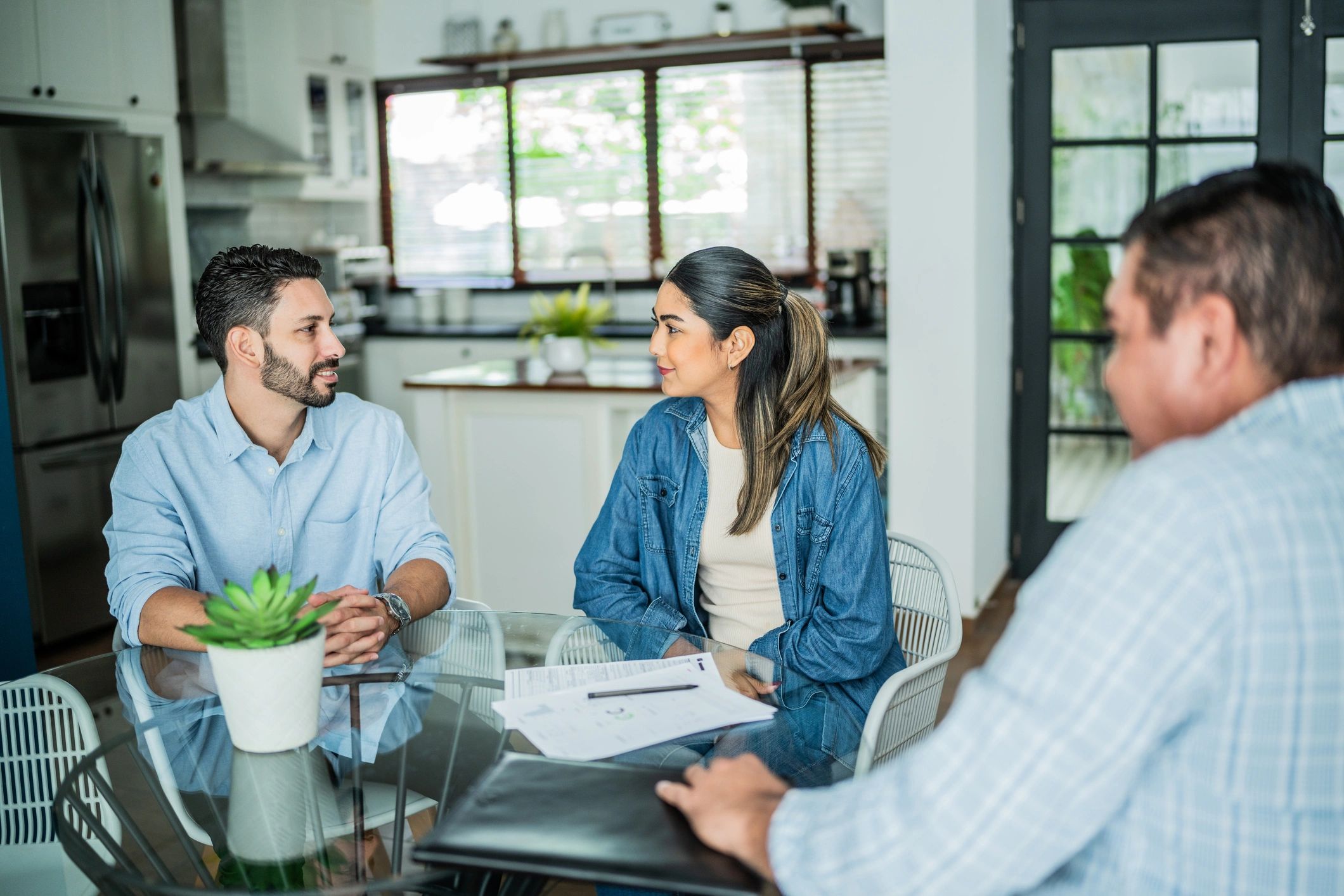 Couple discussing home selling plans at home
