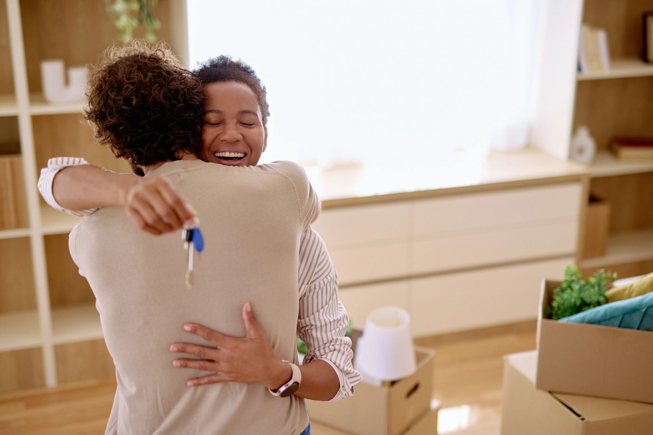 Happy couple celebrating their new home
